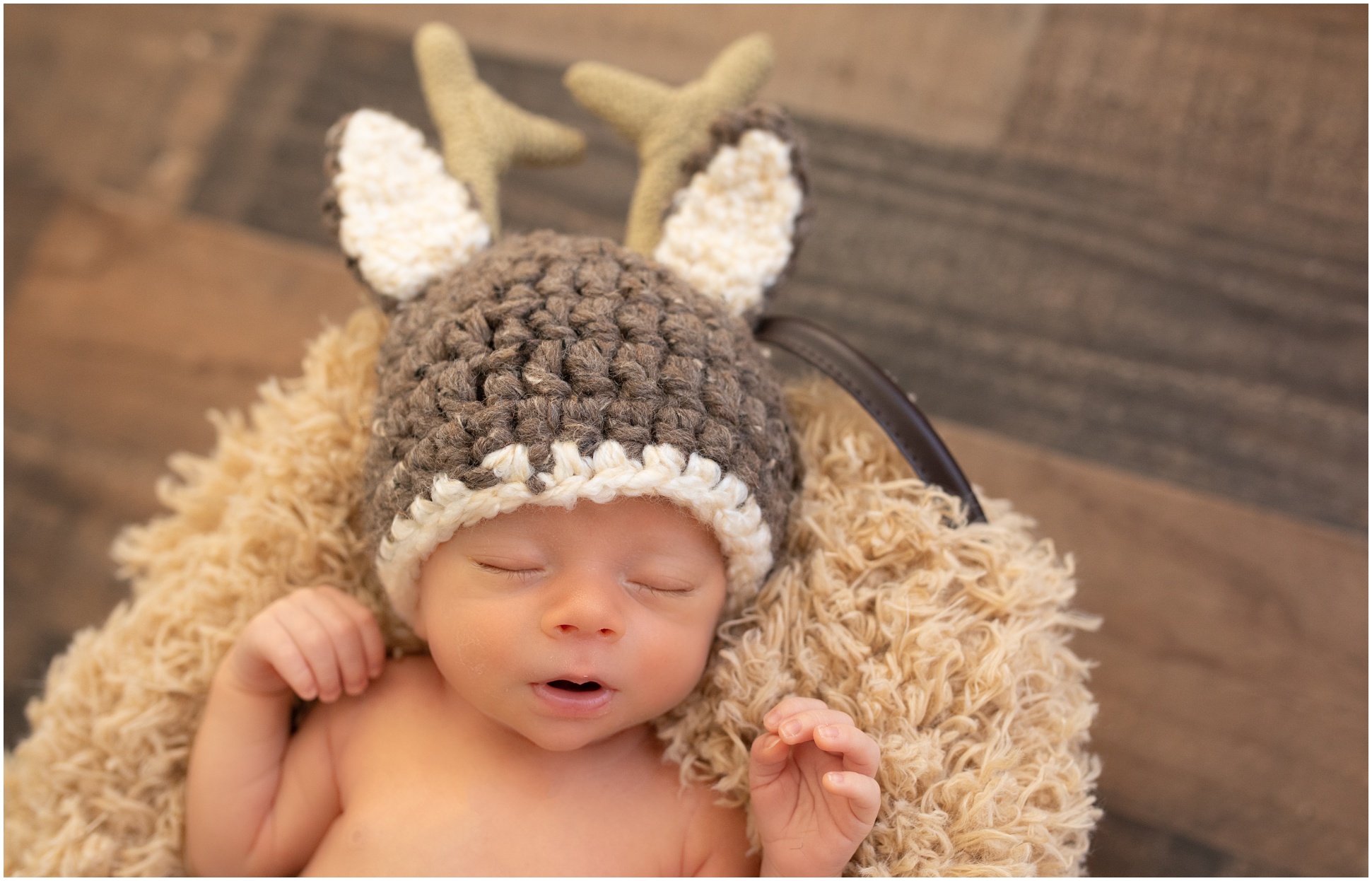 AZ Newborn Baby Boy Wearing a Knitted Deer Outfit