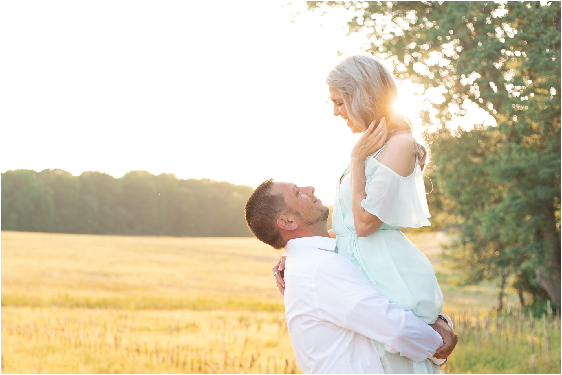 Husband and Wife Portraits in the field of golden light