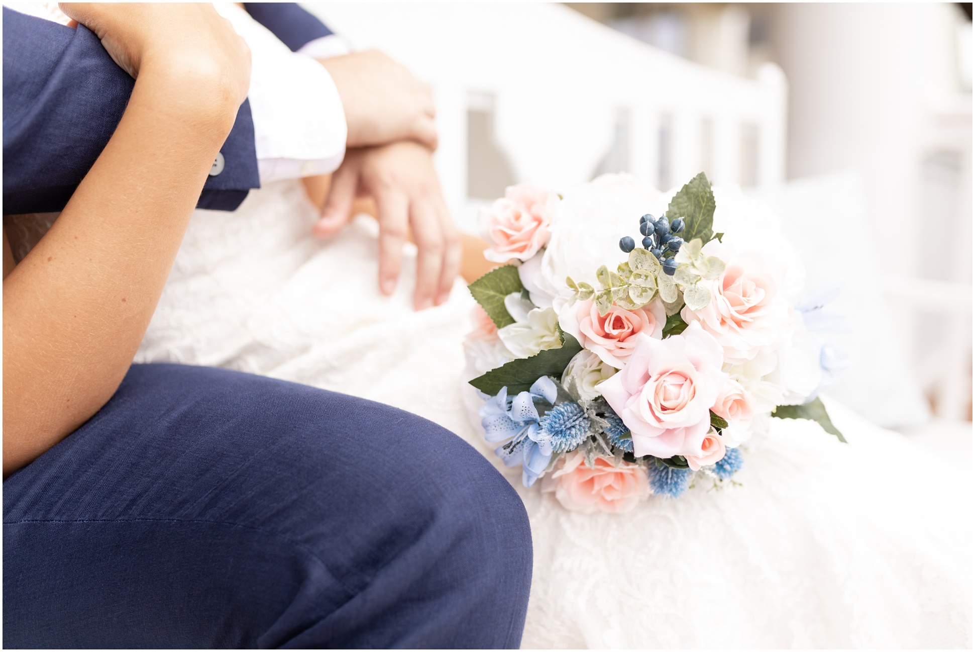 up close shot of bouquet on the bride's lap