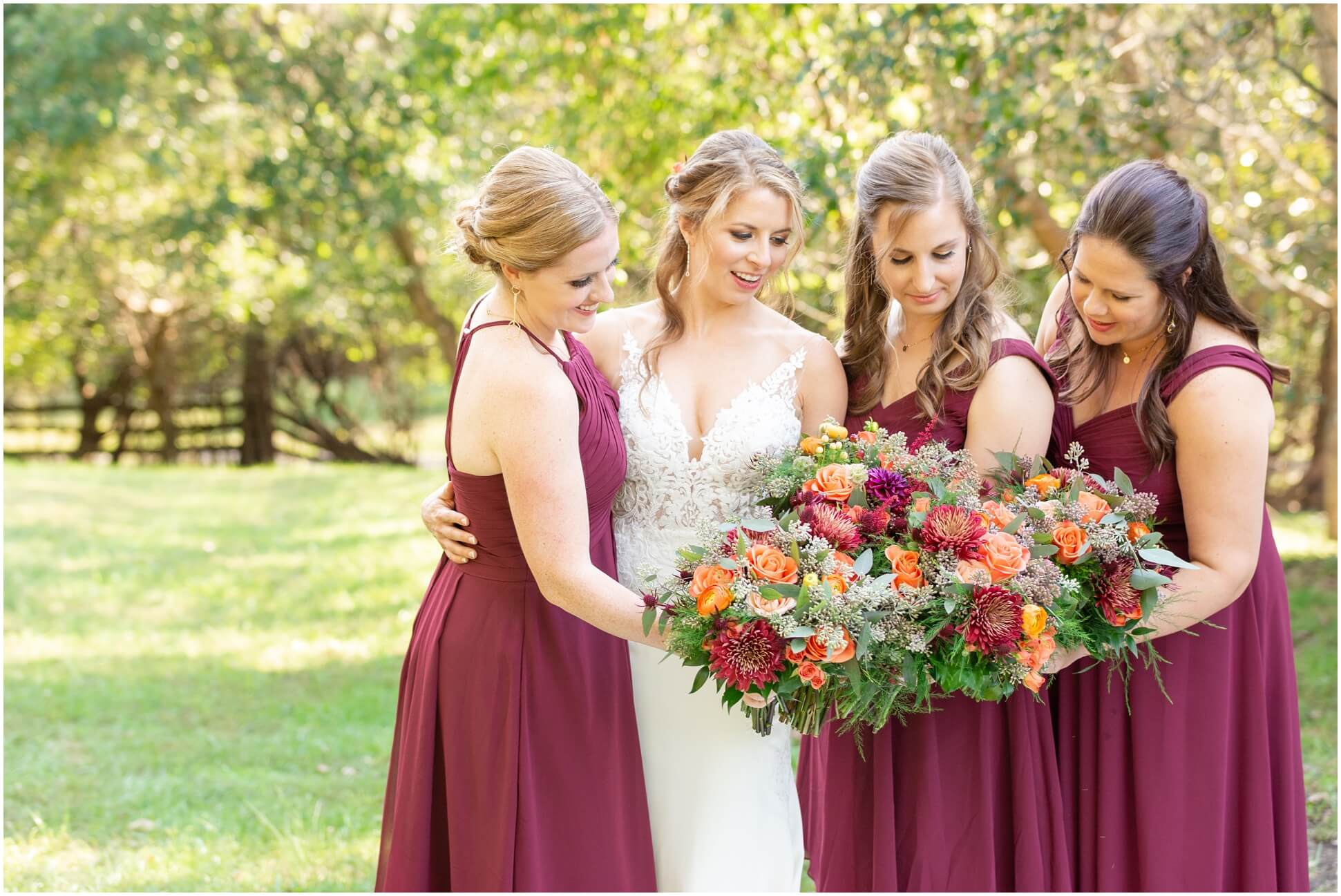 BRIDESMAIDS PORTRAITS, BRIDE IN WHITE LACE GOWN AND BRIDESMAIDS IN BURGUNDY DRESSES WITH FLORALS FROM RICK'S FLORALS