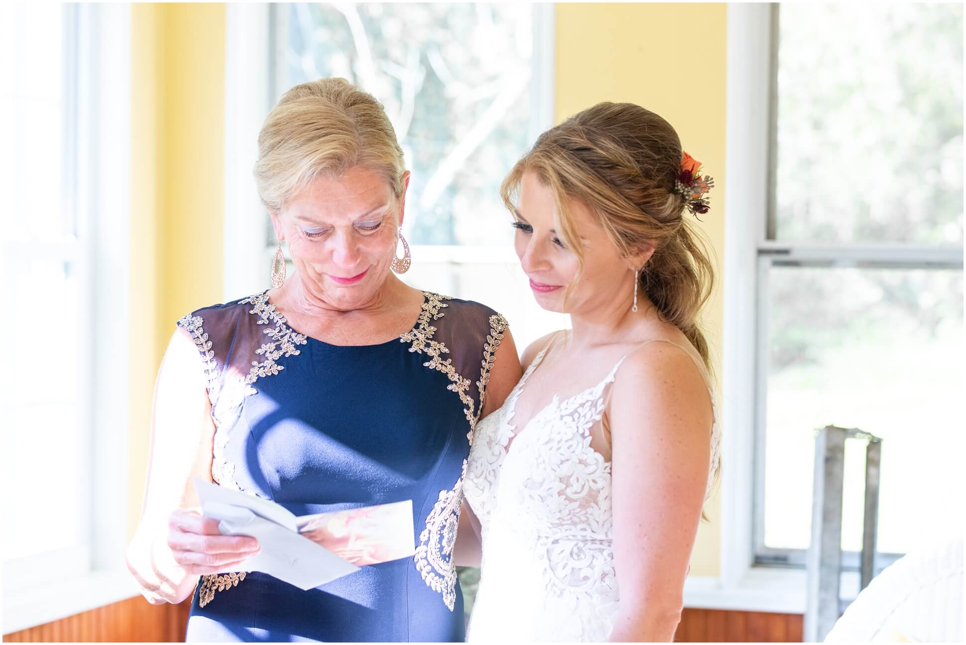 BRIDE'S MOM READING HER CARD ON HER DAUGHTER'S WEDDING DAY