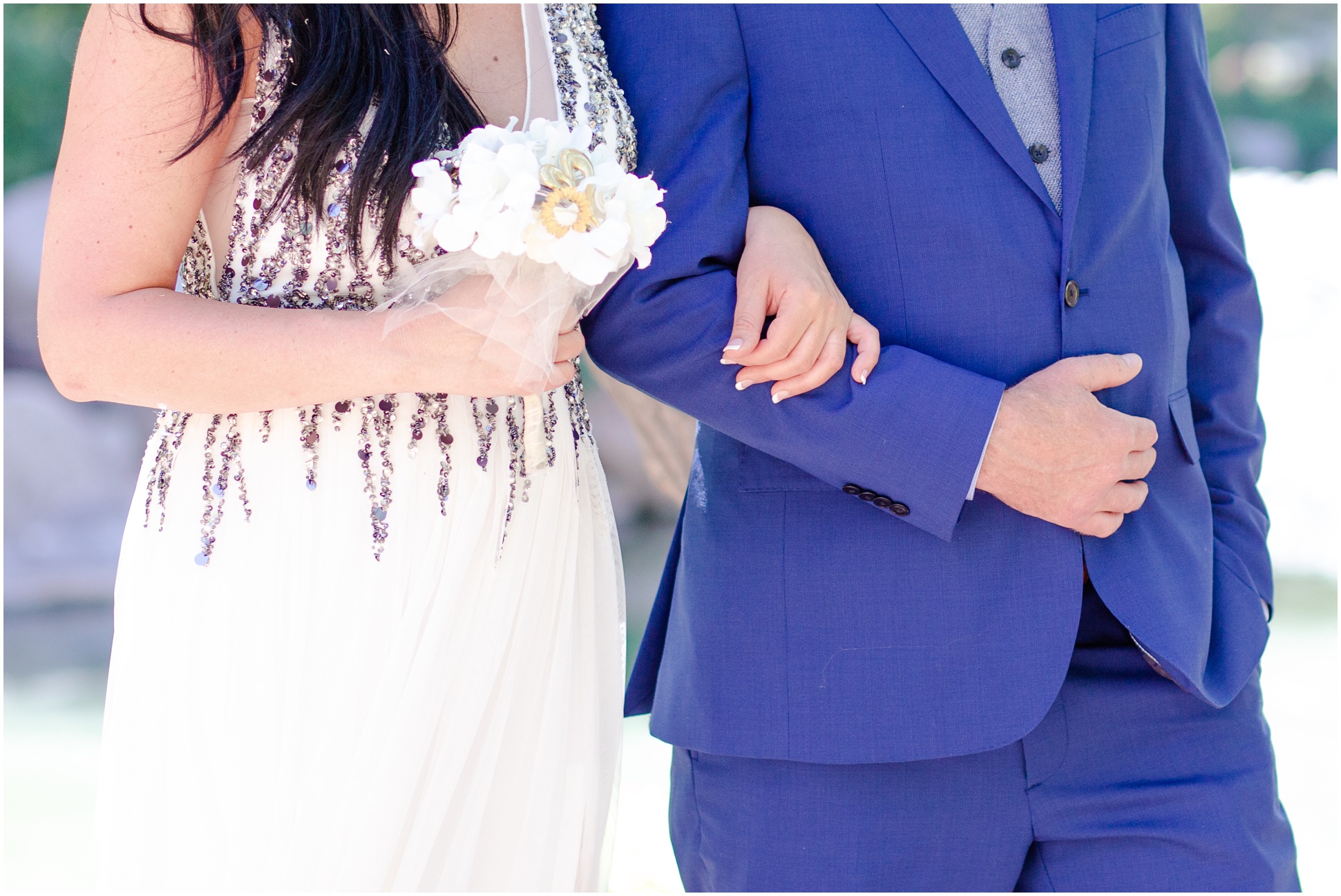 Close up of Holli and JB holding onto each other during their ceremony