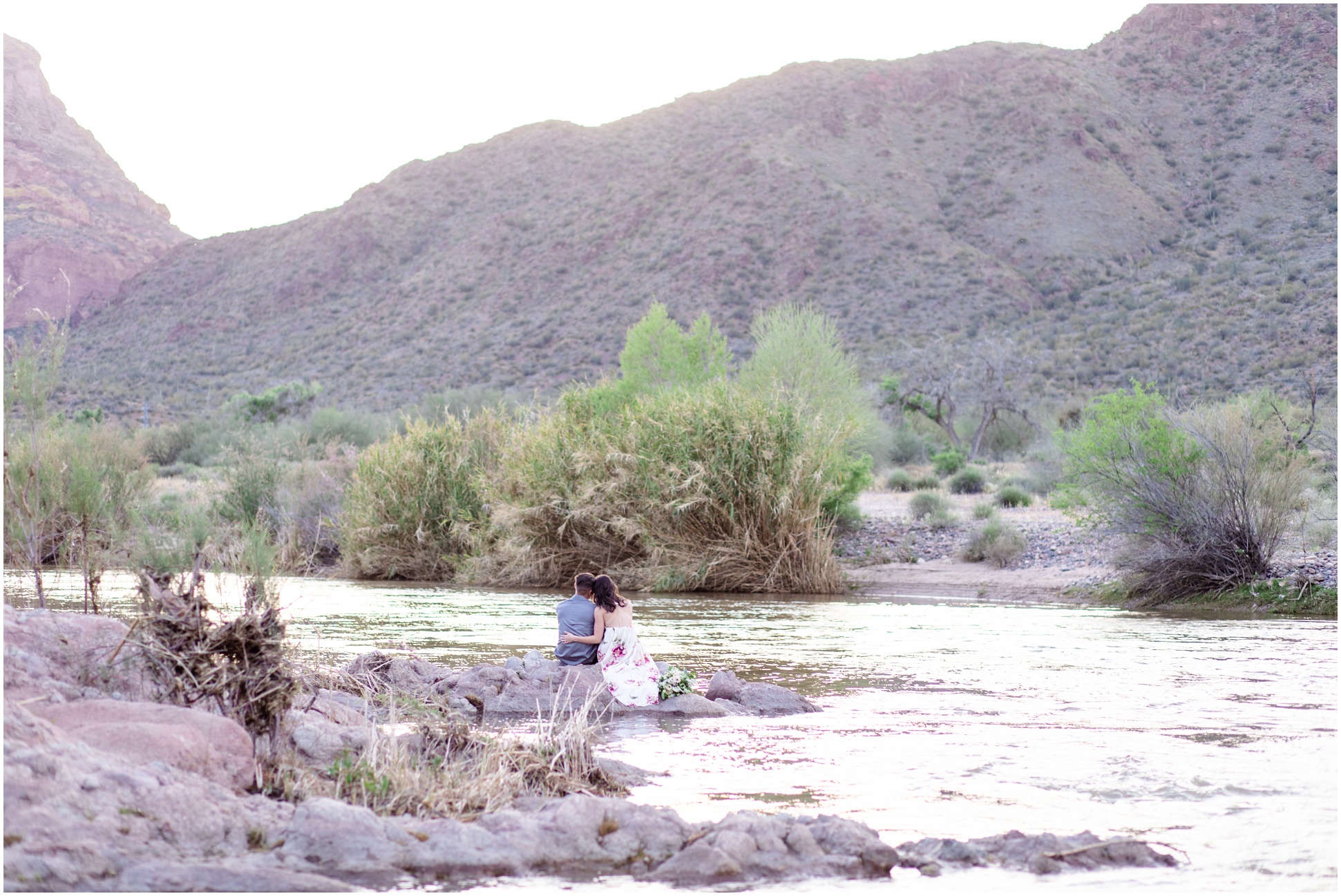 Jessica and Michael sitting at the Salt River in Arizona 