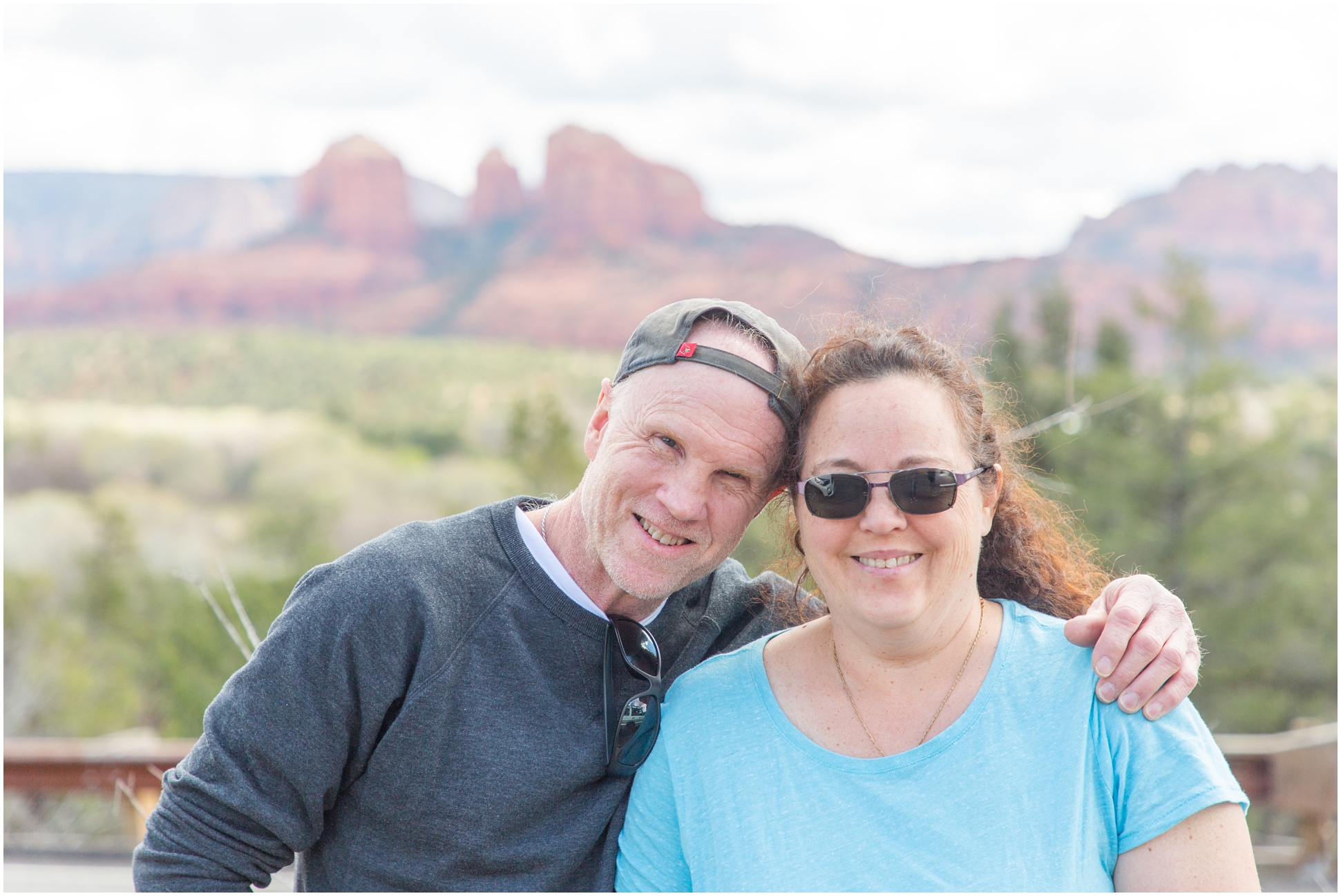 My mom and dad in front of the red rocks in Sedona