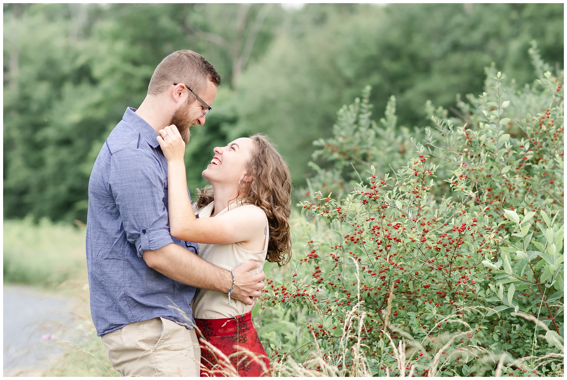 Couple giggling at each other on one of the trails at Rocky Ridge Park in York, PA