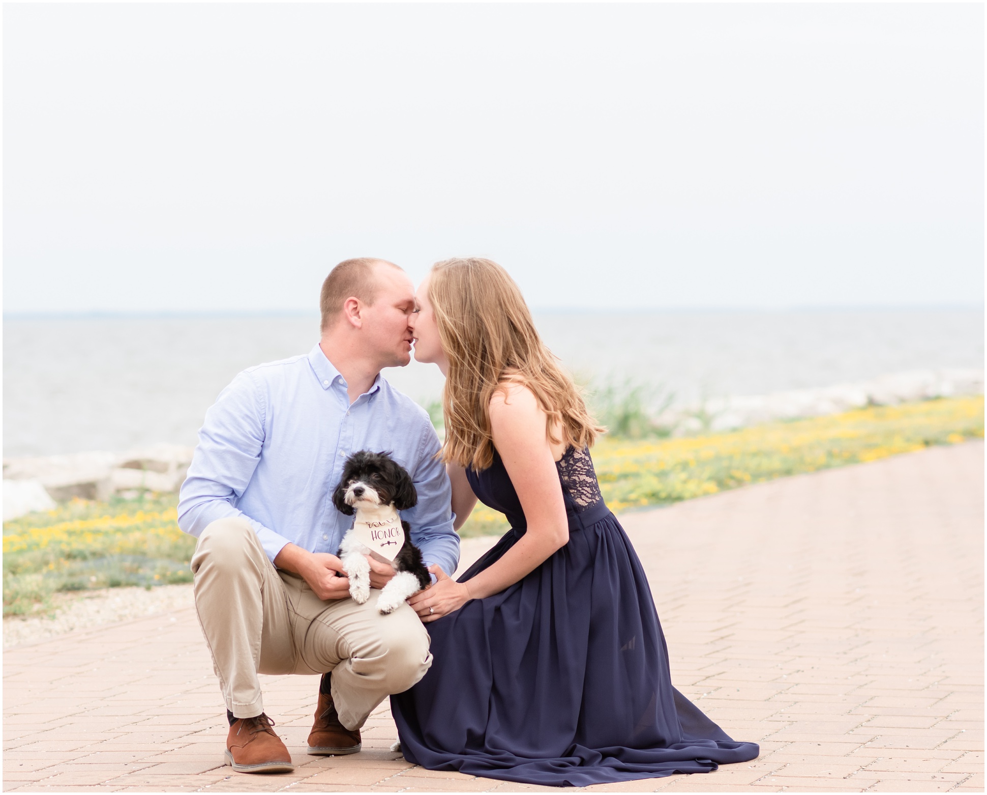 Bride and Groom Couple at North Point State Park with their black and white dog Dixie