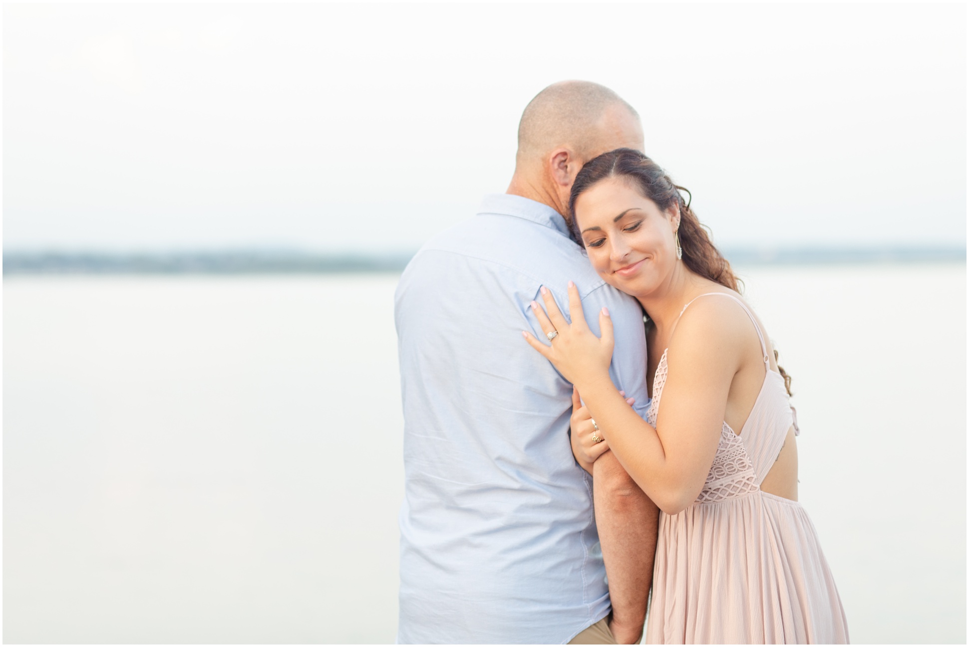Engagement session with bride wearing blush dress with tied back.