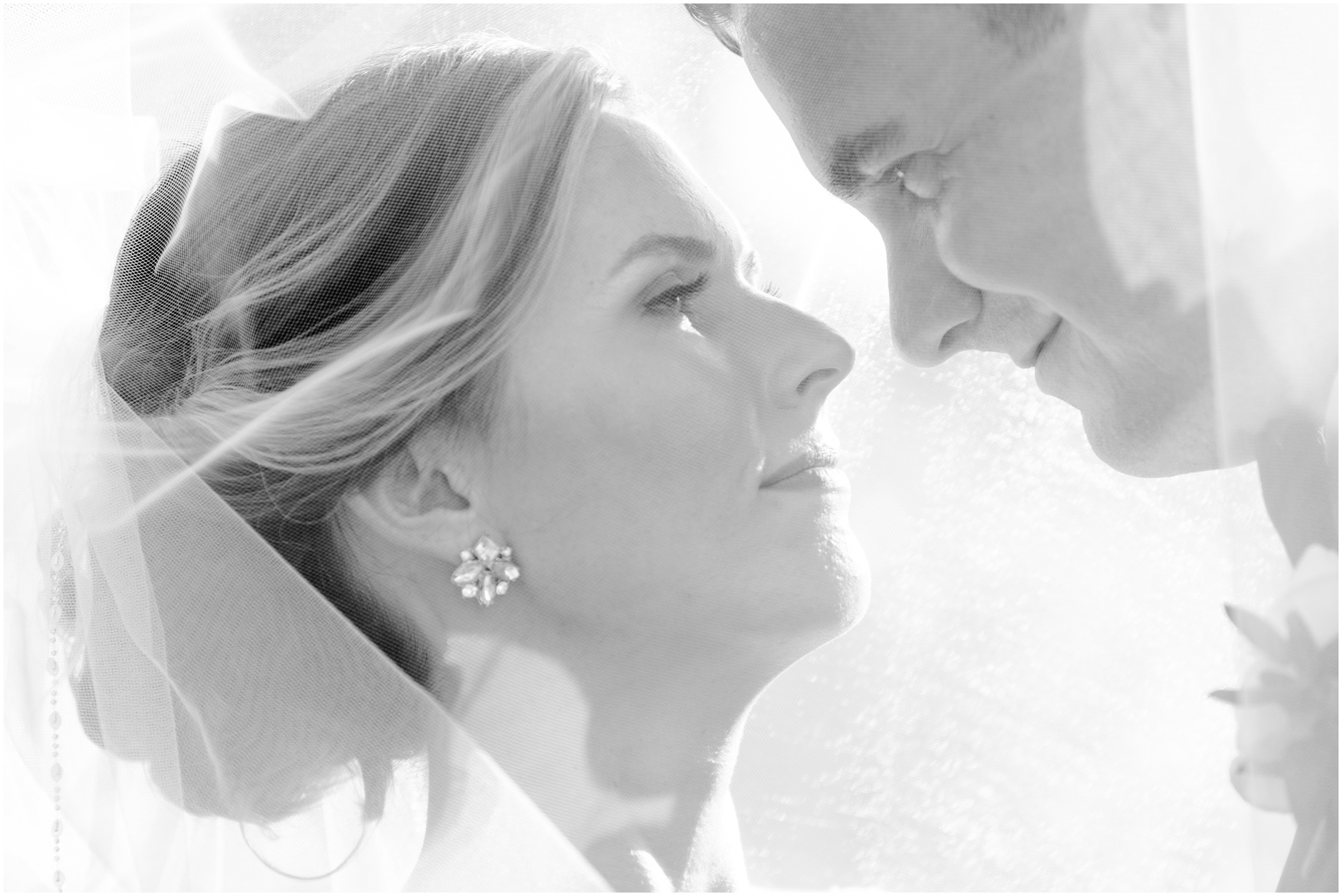 Black and White of Bride and Groom looking into each others eyes