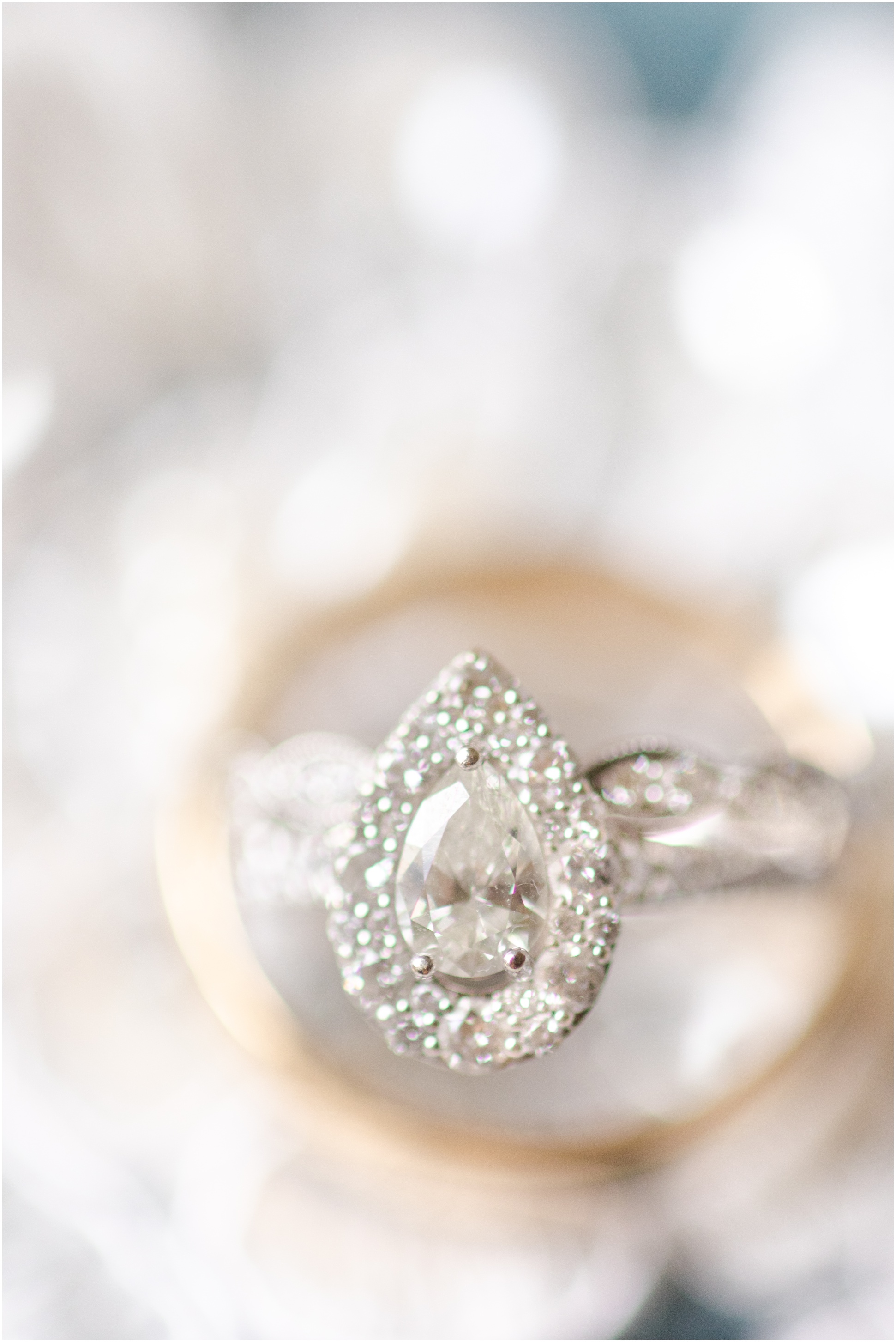 Close up of tear drop engagement ring