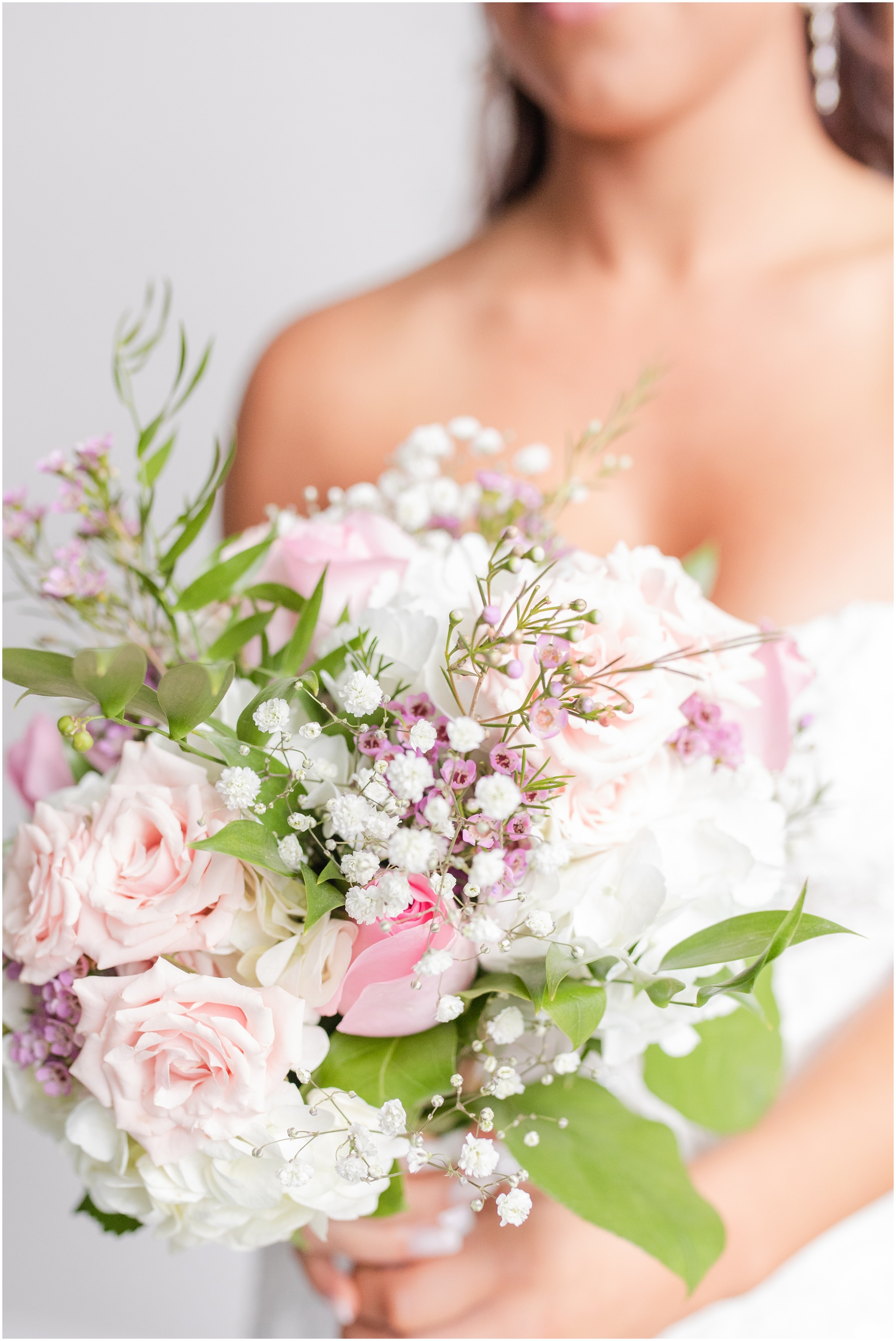 close up of the bride holding her bouquet