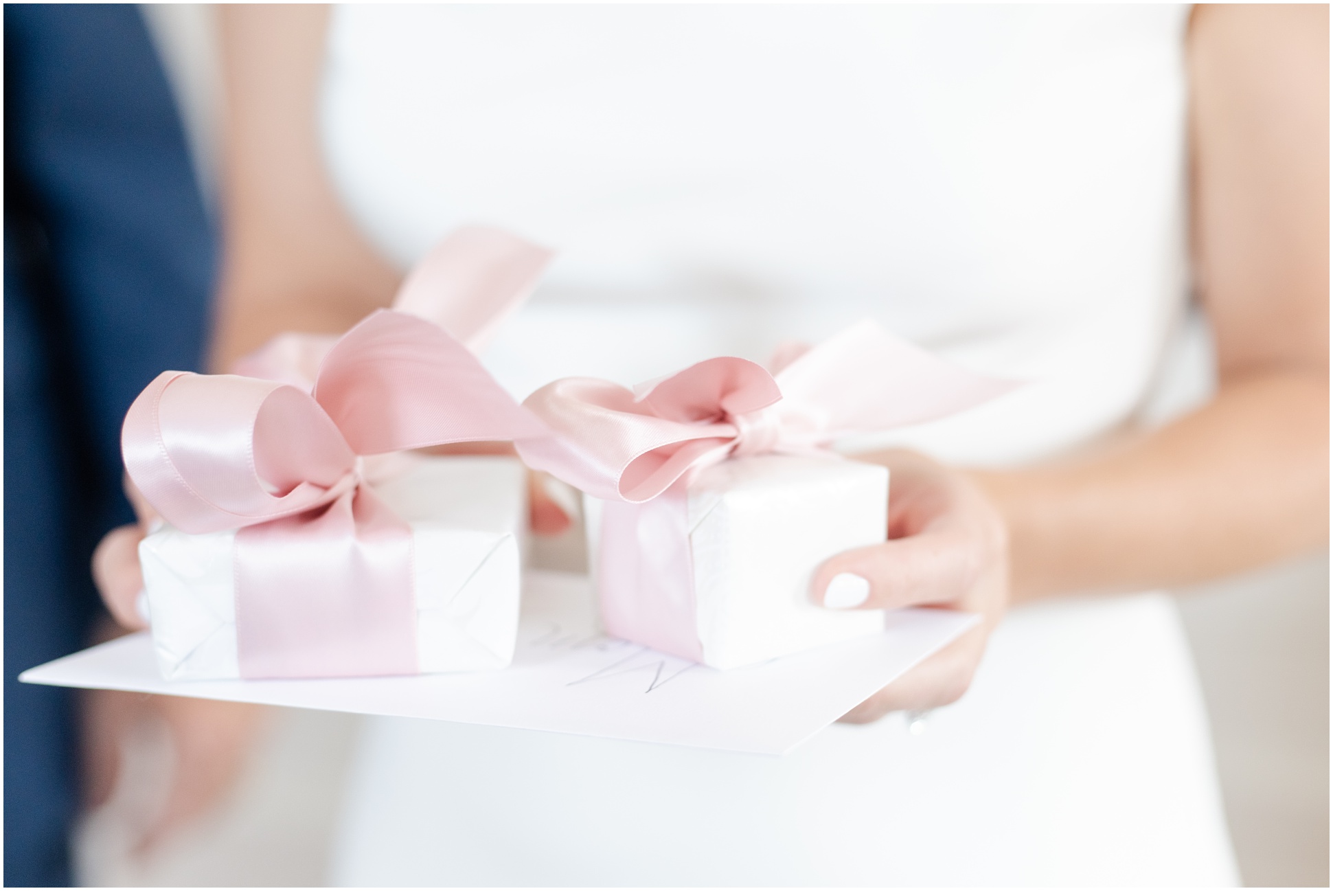 Bride holding parent gifts