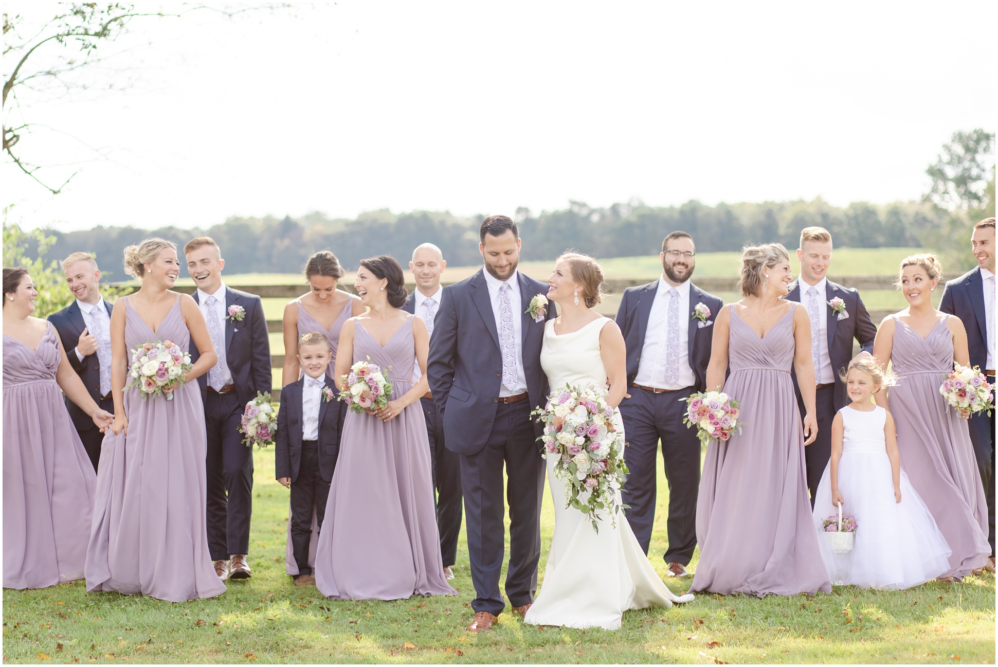 Full bridal party walking toward the camera