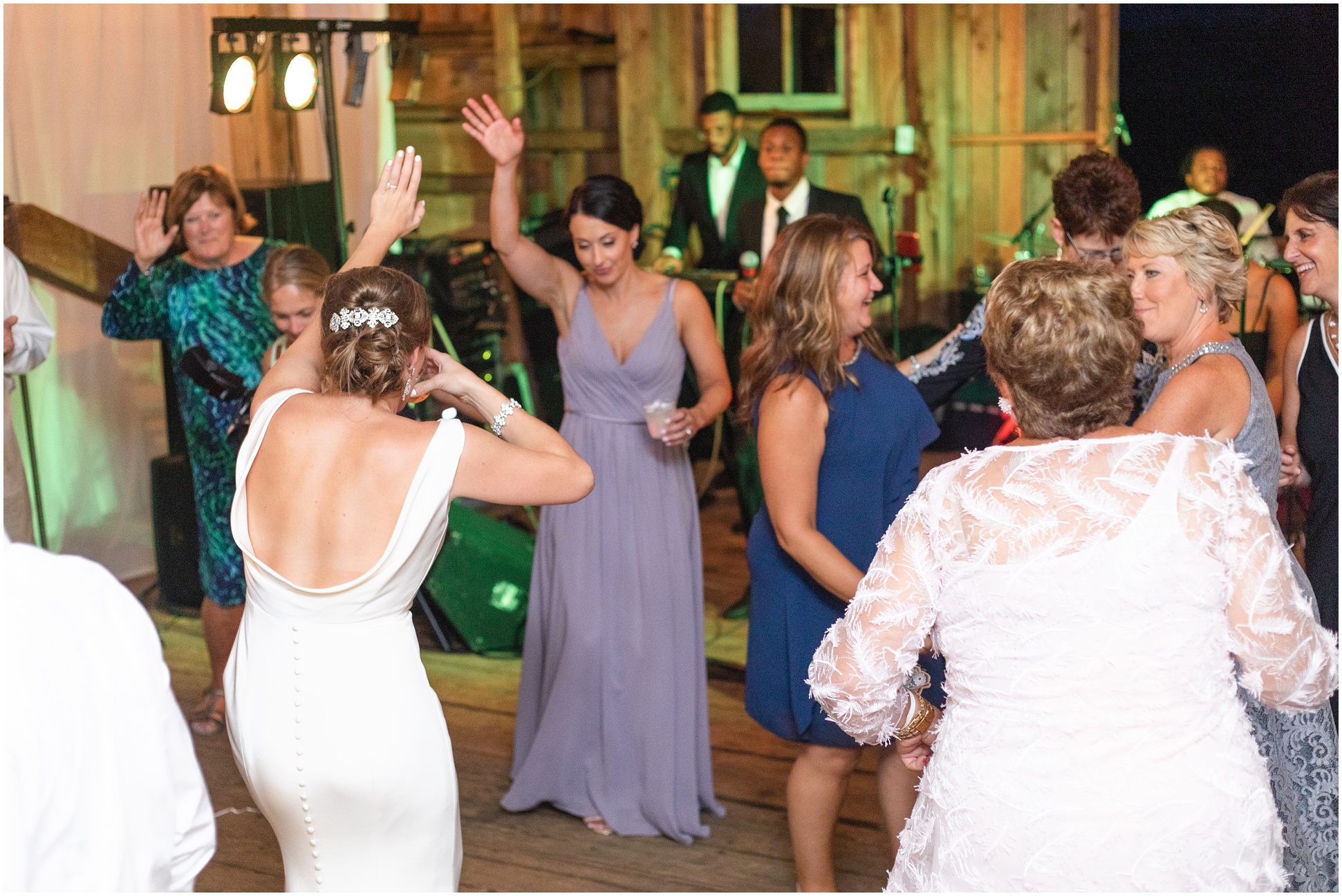 Guests dancing in the Magley farm during the reception
