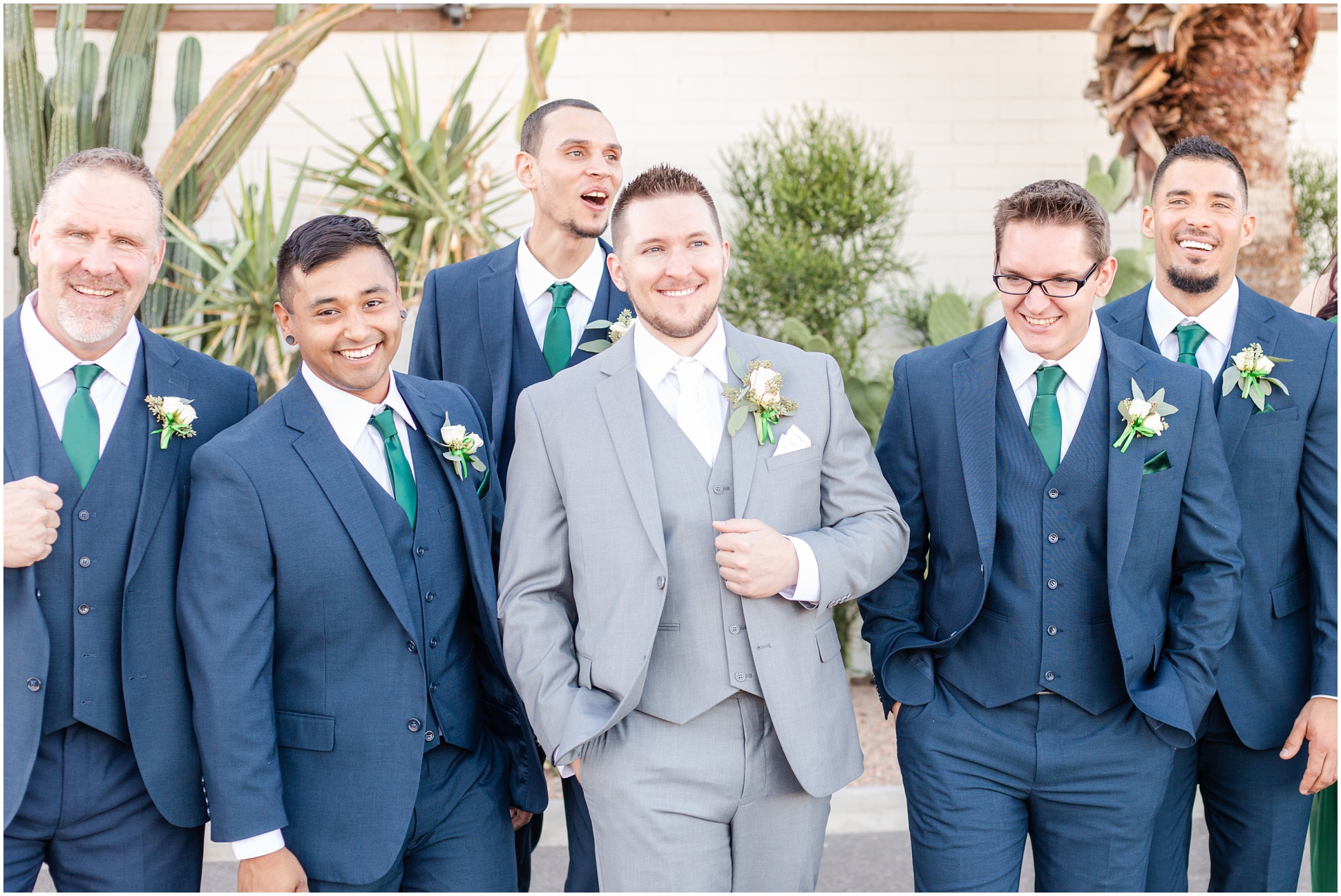 Group photo of Groom and Groomsmen laughing