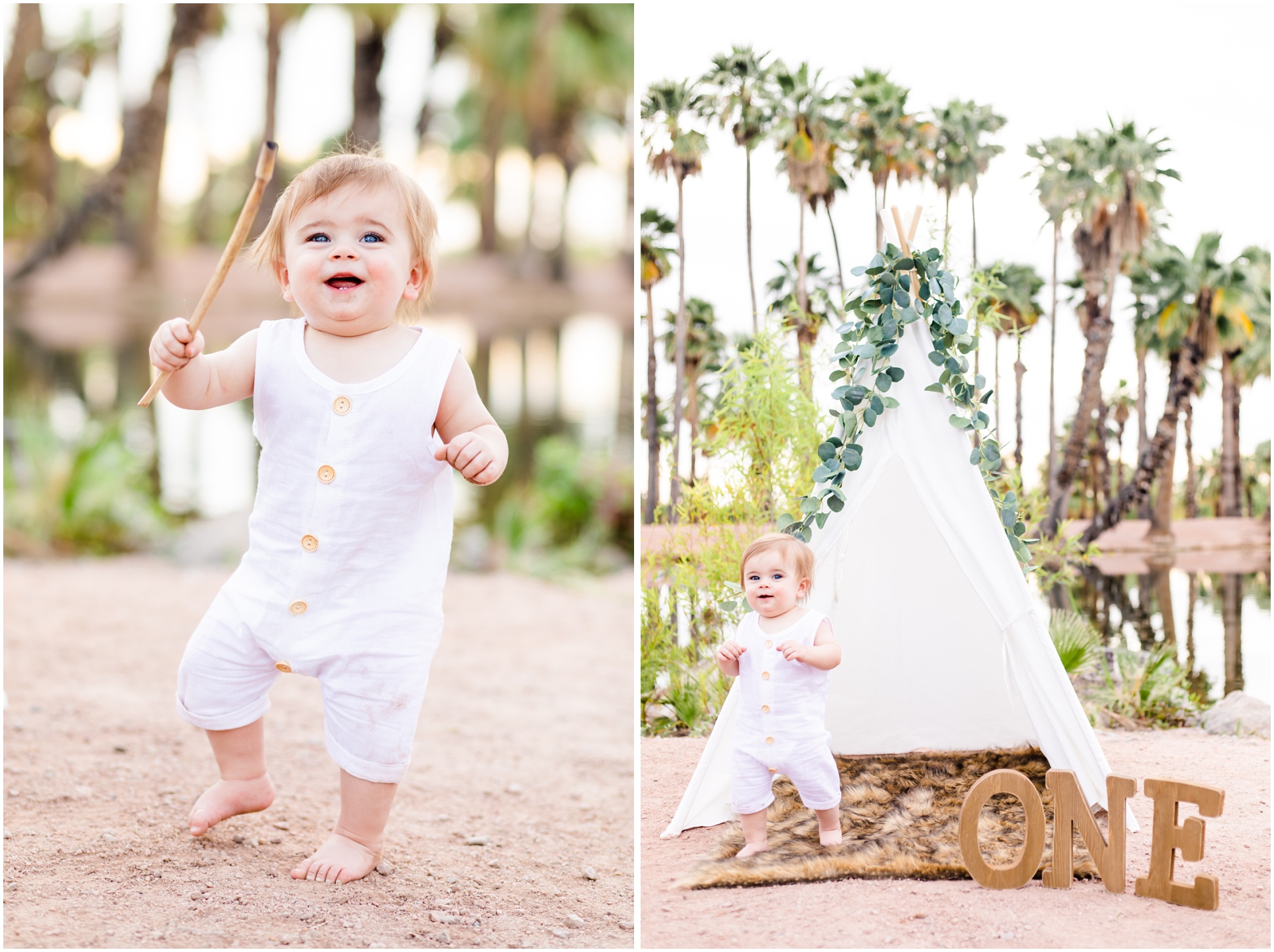 baby in white onesie dancing with stick; baby standing in front of white tent with greenery hanging on top and letters spelling ONE infront