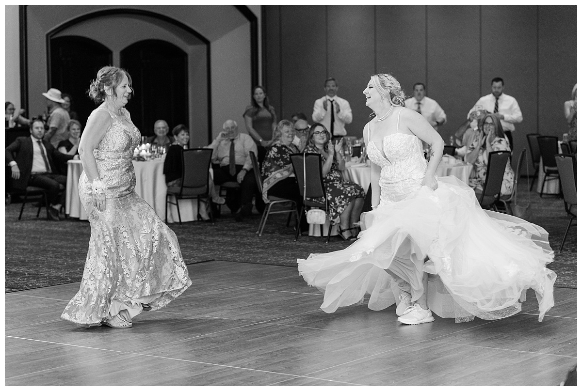 bride and mother dancing