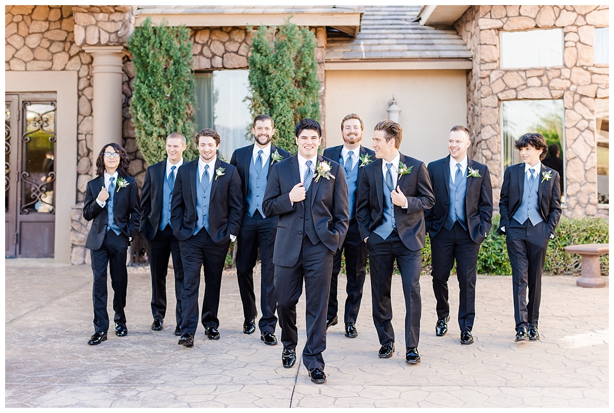 Groomsment walking at Superstition Manor