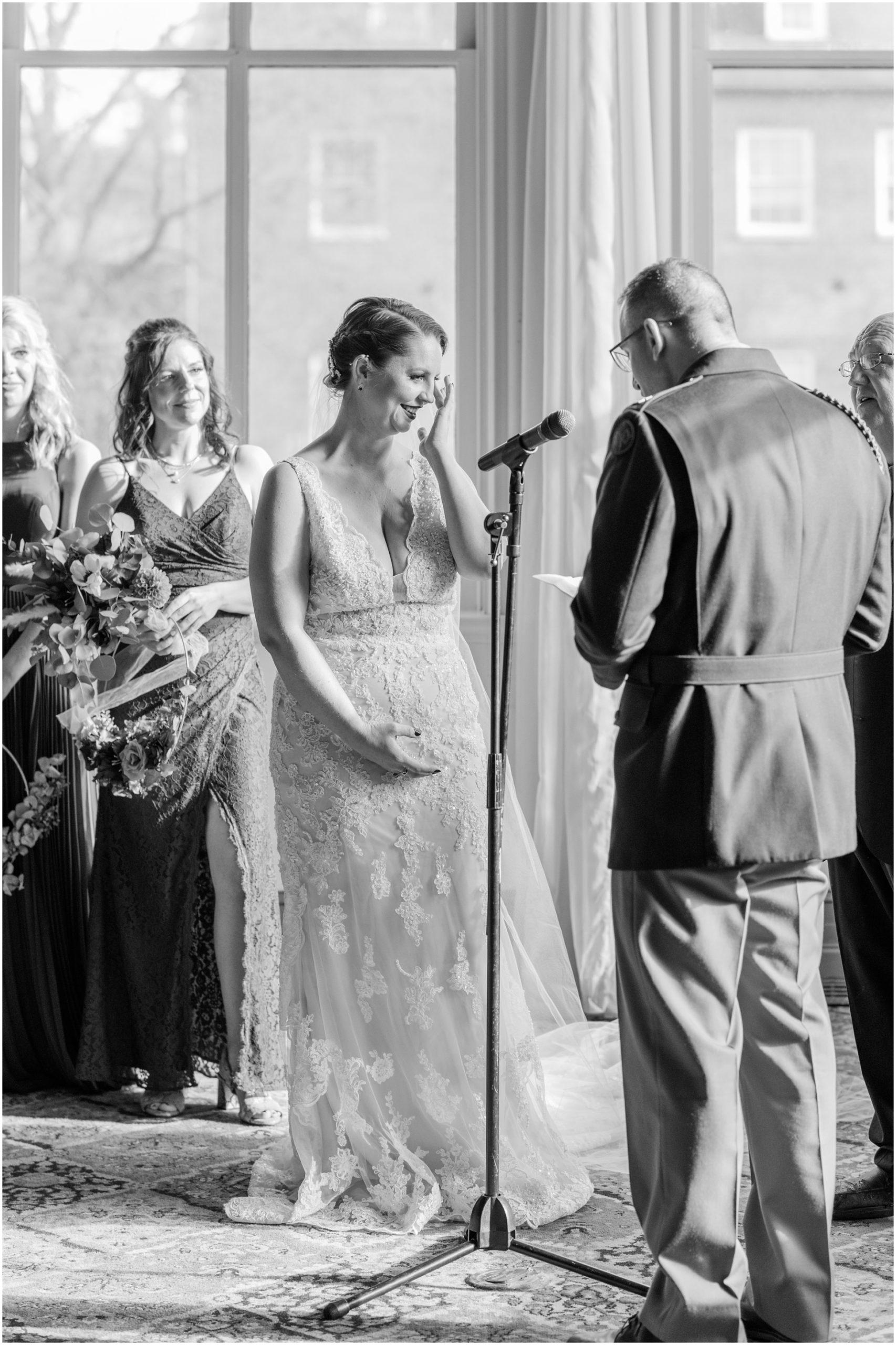 Bride crying at ceremony